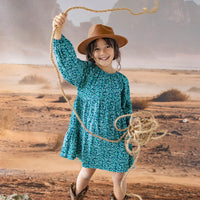 Turquoise dress with a floral pattern, child