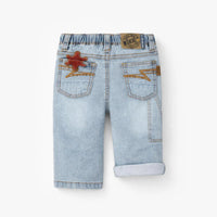 Pale blue jeans with star patch, baby