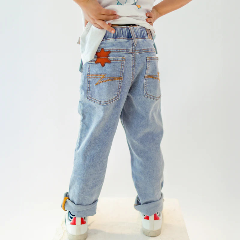 Pale blue jeans with star patch, child