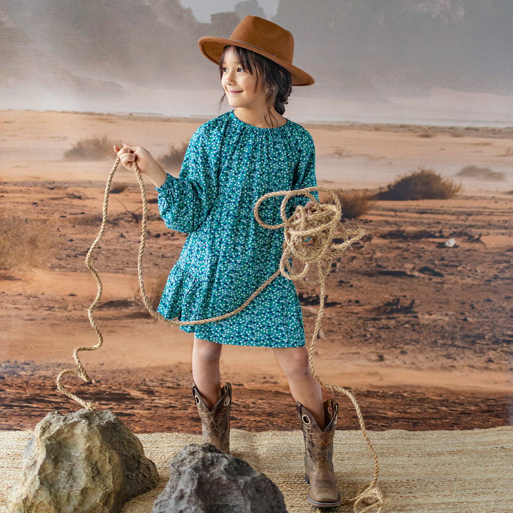 Turquoise dress with a floral pattern, child