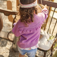 Purple knit cardigan with star patterns, baby