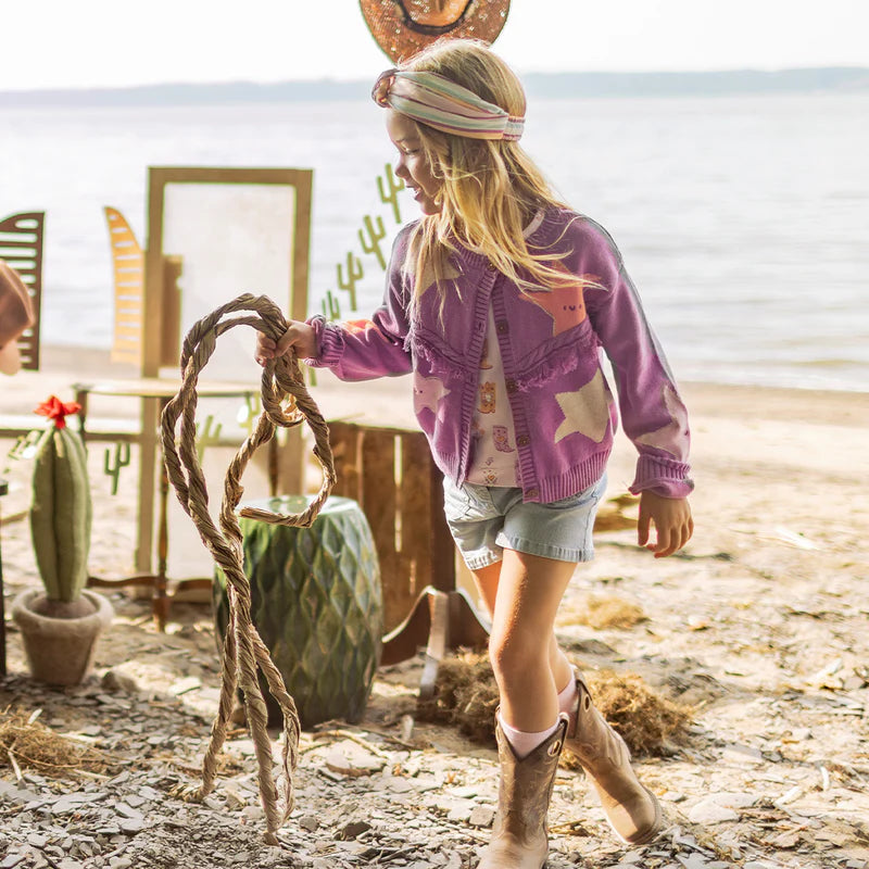 Purple knit cardigan with star patterns, child