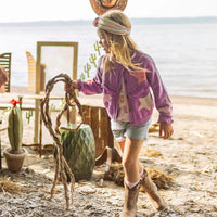 Purple knit cardigan with star patterns, child