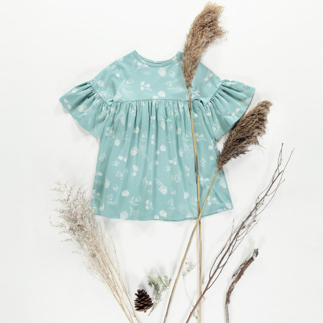 LIGHT TURQUOISE DRESS WITH HAZELNUTS PATTERN IN SOFT JERSEY, CHILD