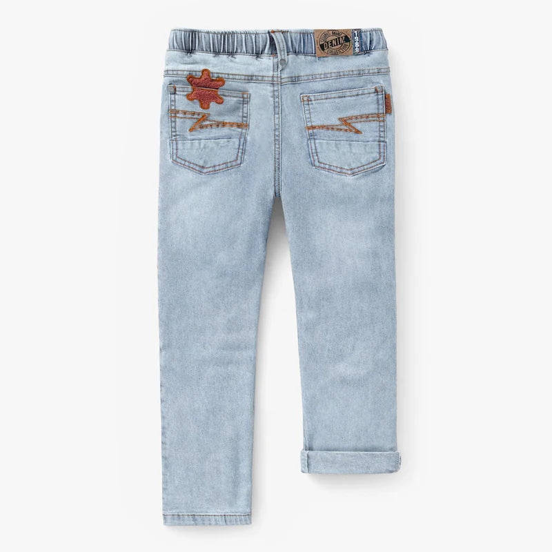 Pale blue jeans with star patch, child