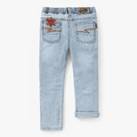 Pale blue jeans with star patch, child