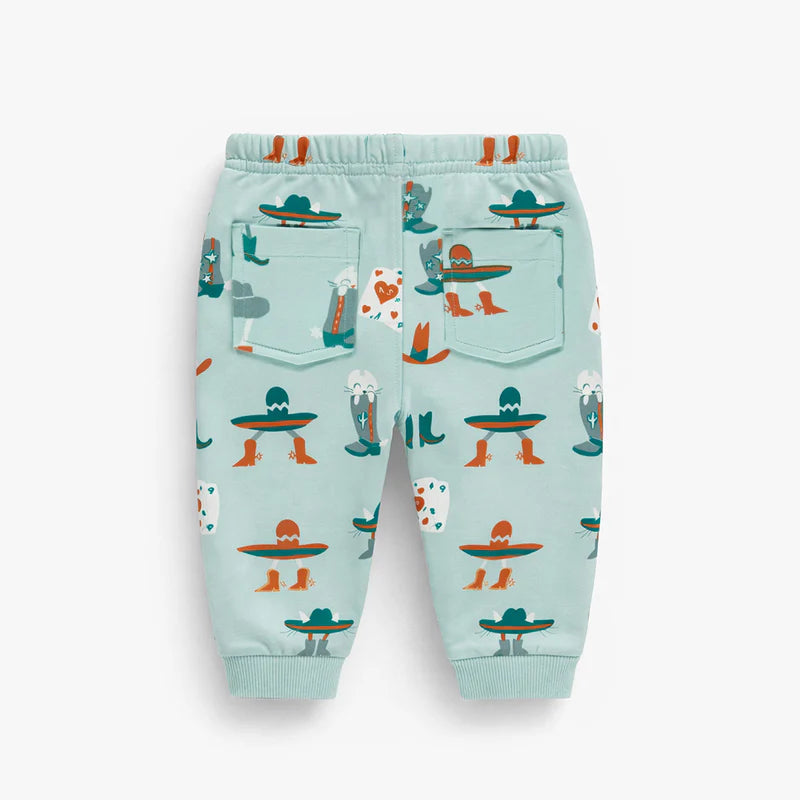 Turquoise sweatpants with western all over print, baby