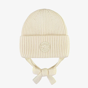 Cream knit toque with cords, baby