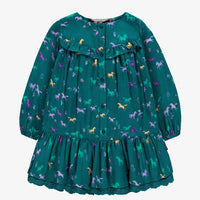 Turquoise dress with all over print, child