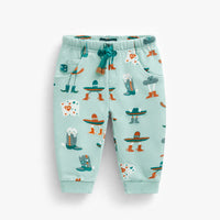 Turquoise sweatpants with western all over print, baby