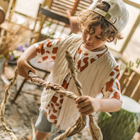 Cream and brown T-shirt with cow pattern, child