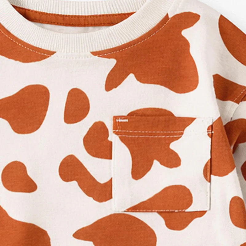 Cream and brown T-shirt with cow pattern, baby