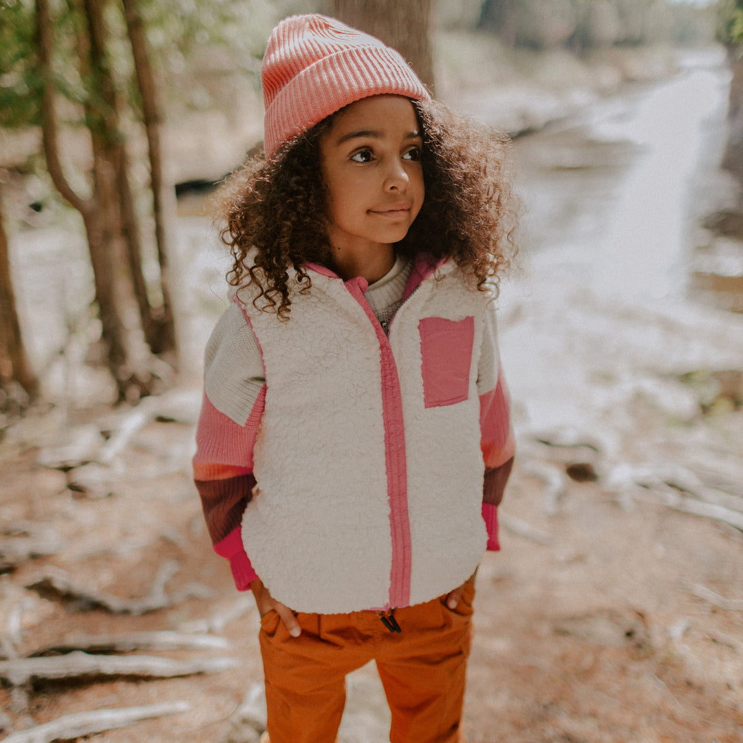 REVERSIBLE PINK NO SLEEVE VEST IN NYLON AND SHERPA, CHILD