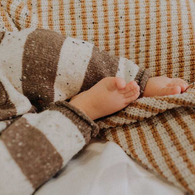 STRIPED BROWN AND WHITE KNIT ONE-PIECE, NEWBORN